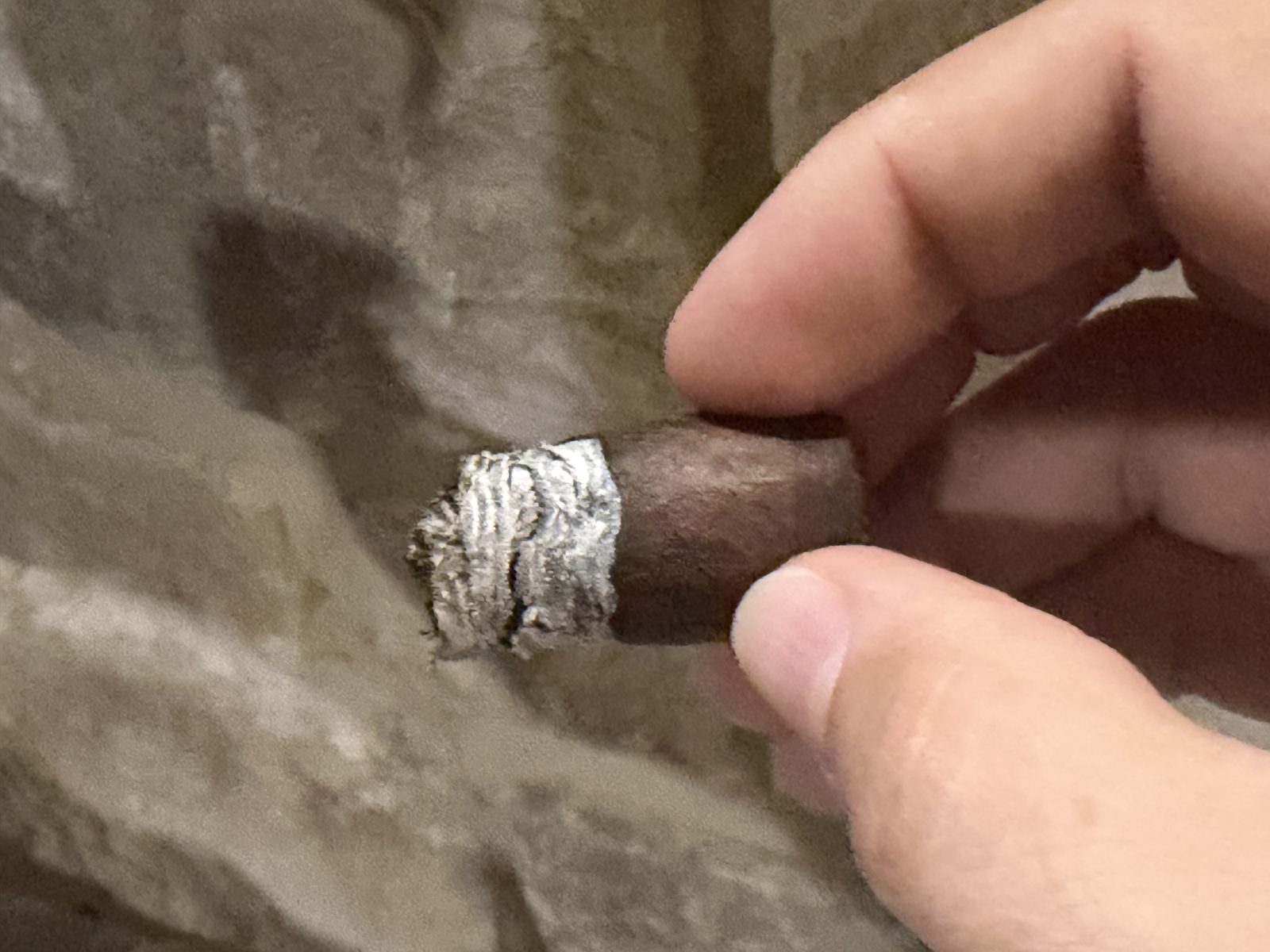 The LecheBurra nub held between fingers with about half an inch remaining