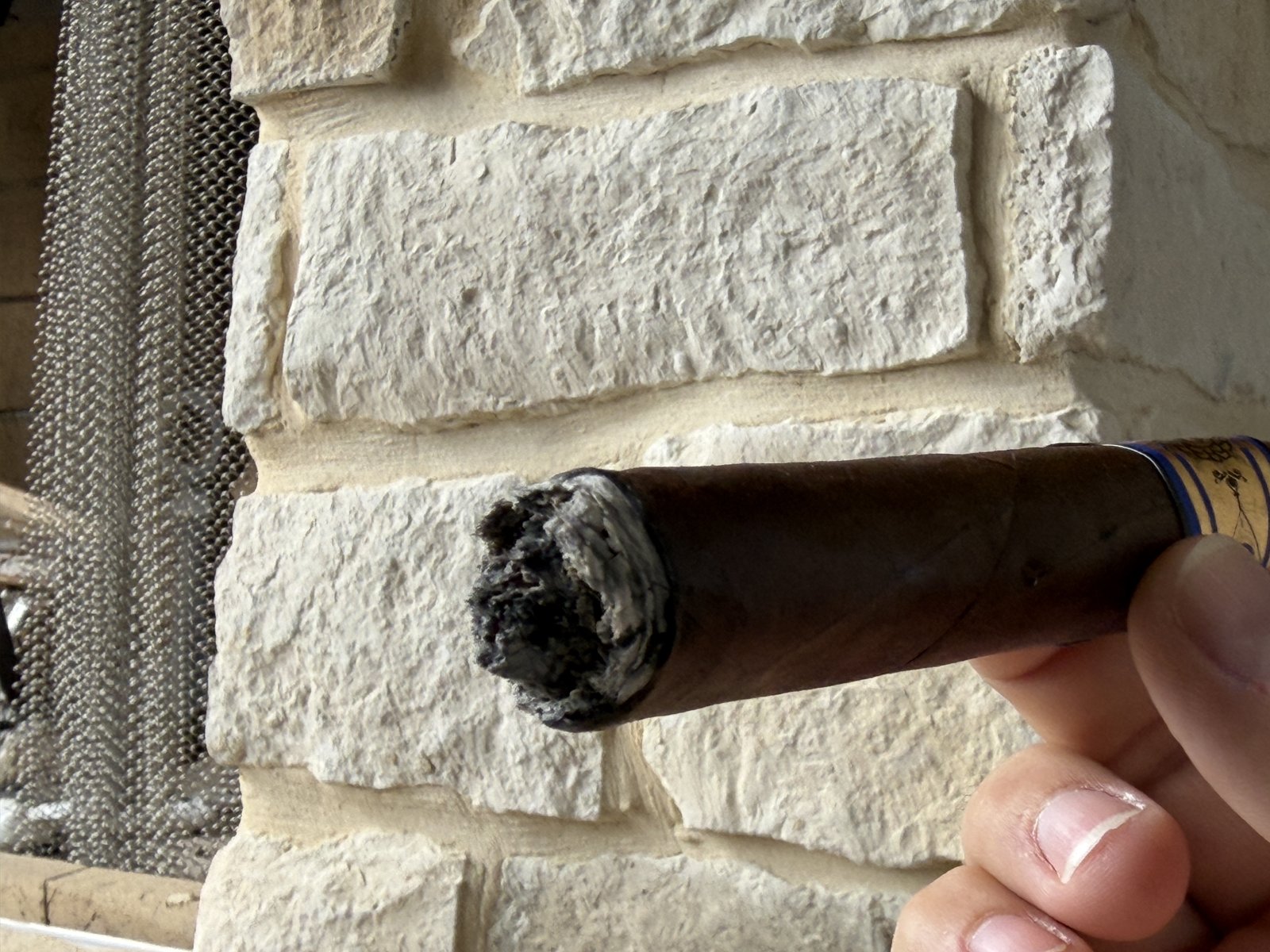 Foot of the Foundation 10 Year Aniversario after the first ash, showing the cone of unburned tobacco in the center Eric calls the Nicaraguan point