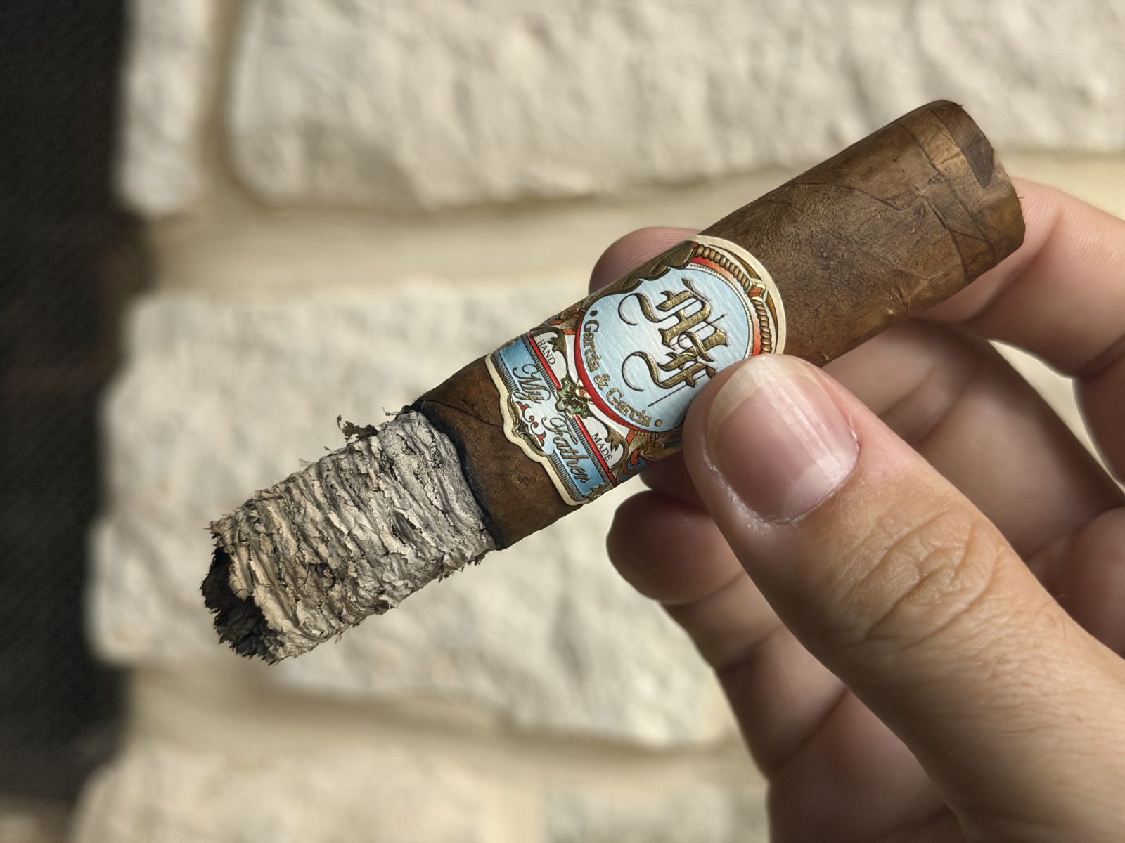 My Father Blue Toro in the second third with the secondary band removed, main band still on, ash building